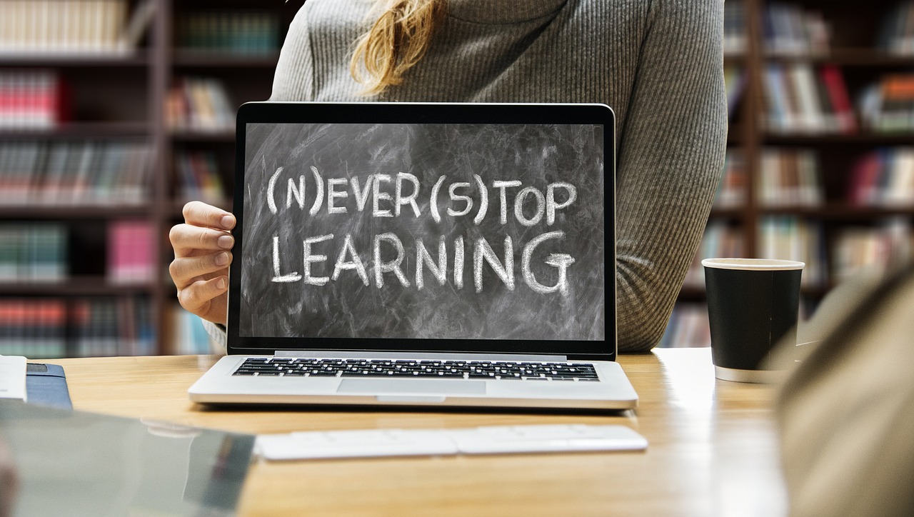 Student engaged in online learning on a laptop